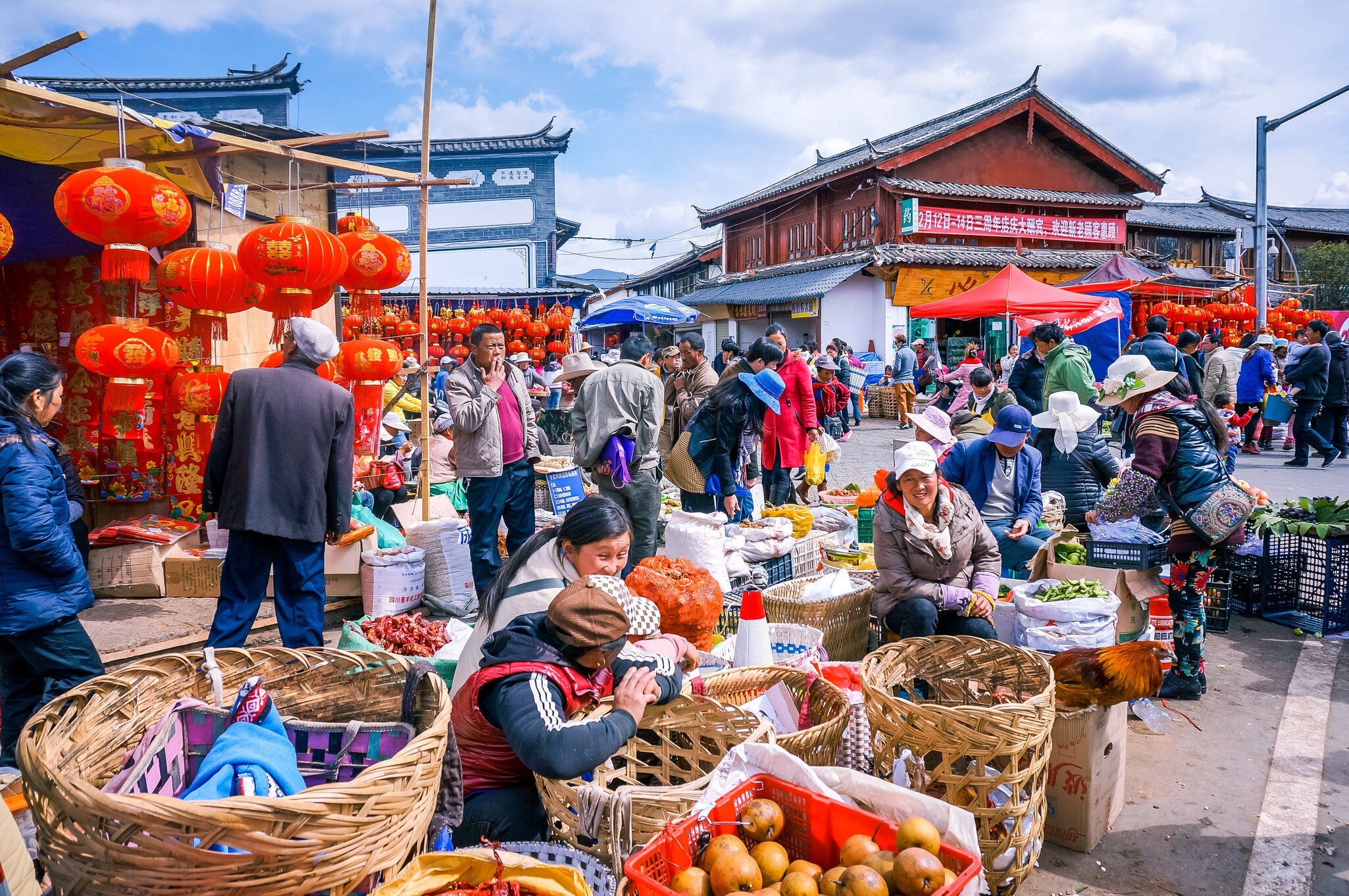 GettyImages-1480813912.jpg
people walk in market at Lijiang old town