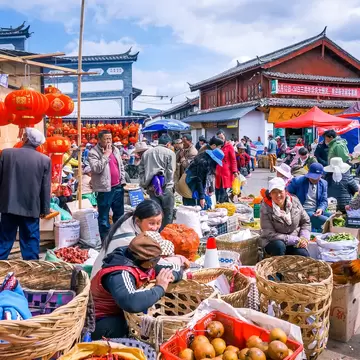 GettyImages-1480813912.jpg
people walk in market at Lijiang old town