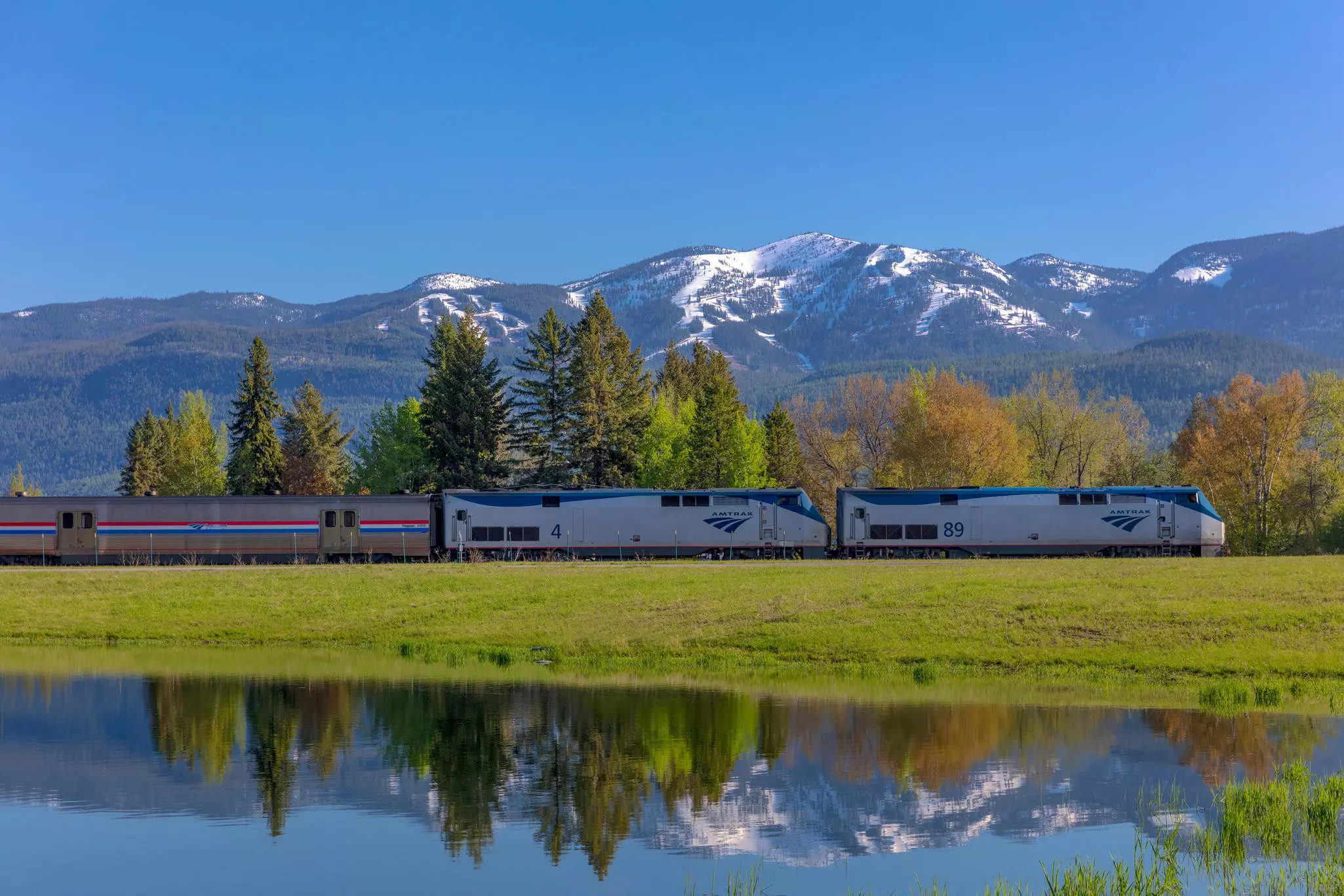 Empire Builder AMTRAK passenger train rolls into Whitefish, Montana, USA