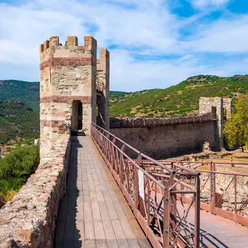 Main tower - Torre Maestra - of the Malaspina Castle, known also as Castle of Serravalle, with monumental historic defense walls and fortification.