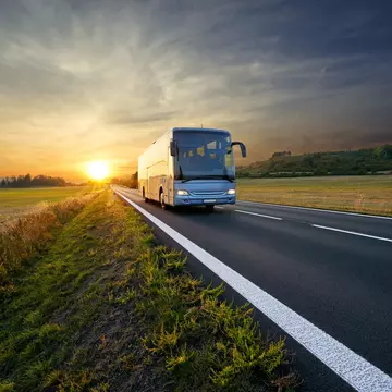 Bus traveling on an asphalt road in a rural area of Czech Republic during sunset.
1095141322
Woodland, Public Transportation, Sunrise - Dawn, Highway, Sun, Vanishing Point, Busing, Diminishing Perspective, Land Vehicle, Gold Colored, Road, Sunny, Intercity Bus, Czech Republic, Horizontal, Photography, Outdoors, Sunlight, Tree, Dawn, Forest, Meadow, Bus, Riding, Cloud - Sky, Rural Scene, Sunset, Orange Color, Coach Service, Summer, Traffic, Travel, Sunbeam, Journey, Transportation, Tourism, Scenics - Nature, Coach, Nature, bus service, Sky, Landscape - Scenery, Driving, Multiple Lane Highway