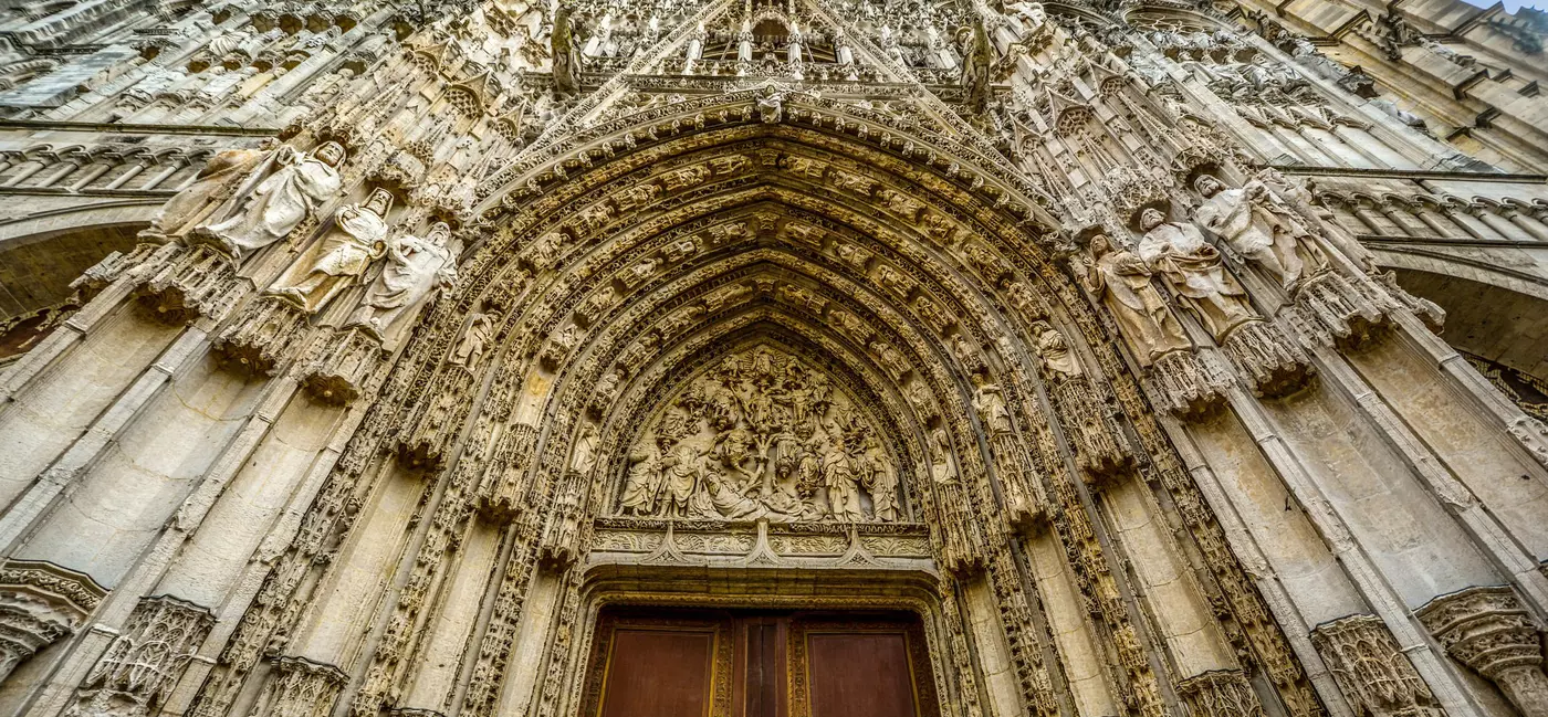 Low-angle view of the Rouen's Notre Dame cathedral Gothic facade