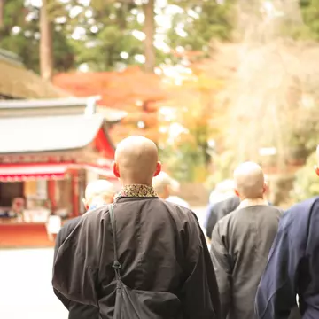 Priests advocating a sutra at the front of Enryakuji temple ,Konpotyudo, Kyoto Japan