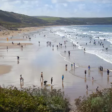 People enjoying the surfing beach of Woolacombe
509804643
Natural Landmark, Tourism, Non-Urban Scene, Leisure Activity, People In The Background, North Devon, Beauty In Nature, Tide, Body Board, Coastline, Headland, Color Image, Devon, Sunbathing, Bodyboarding, Surfboard, Idyllic, British Culture, Travel Destinations, Vacations, Outdoors, Panoramic, Horizontal, High Angle View, Surfing, Recreational Pursuit, Tourist, People, England, UK, Europe, Day, Sand, Beach, Bay, Coastal Feature, Horizon, Sand Dune, Landscape, Cloud, Sky, Atlantic Ocean, Sea, Water's Edge, Surf, Wave, Water, beach holiday, woolacombe, Travel Locations