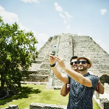 Travelling together can be testing at times, but the experience can deepen your relationship. Thomas Barwick / Getty Images