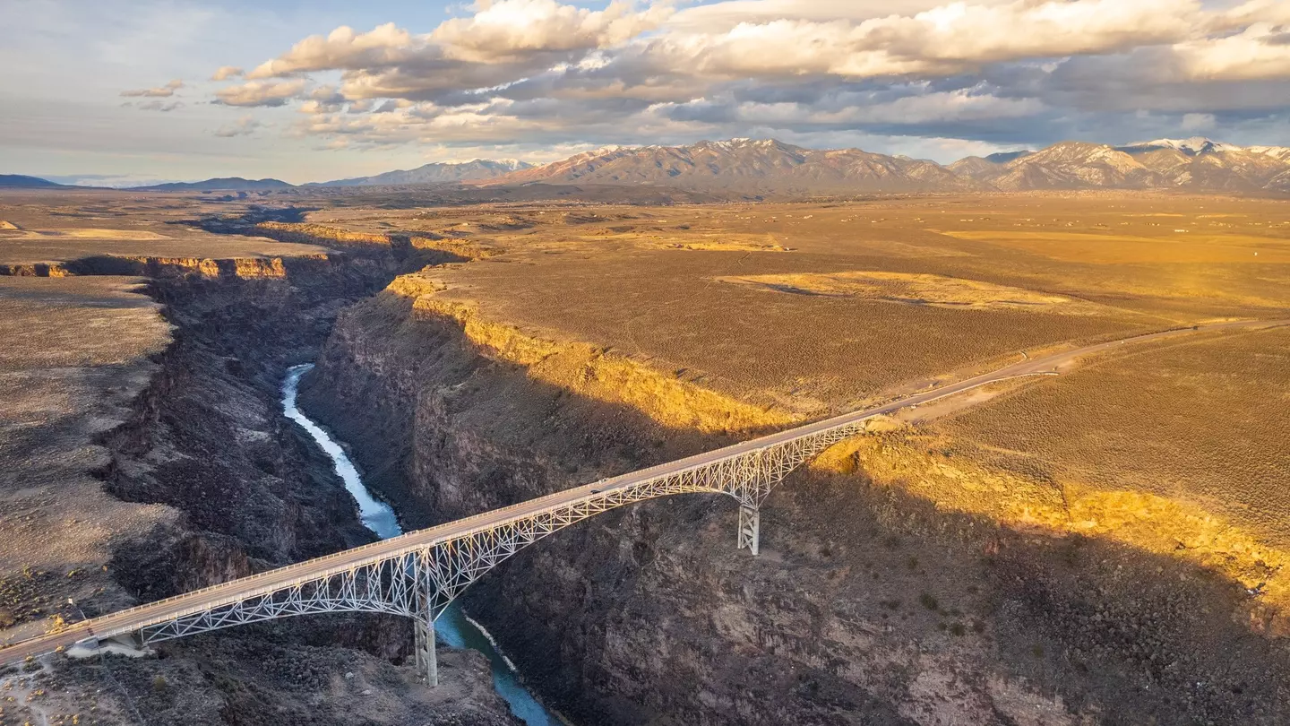 An aerial view of the Rio Grande River Gorge Bridge, which spans this dramatically deep gorge near Taos, New Mexico