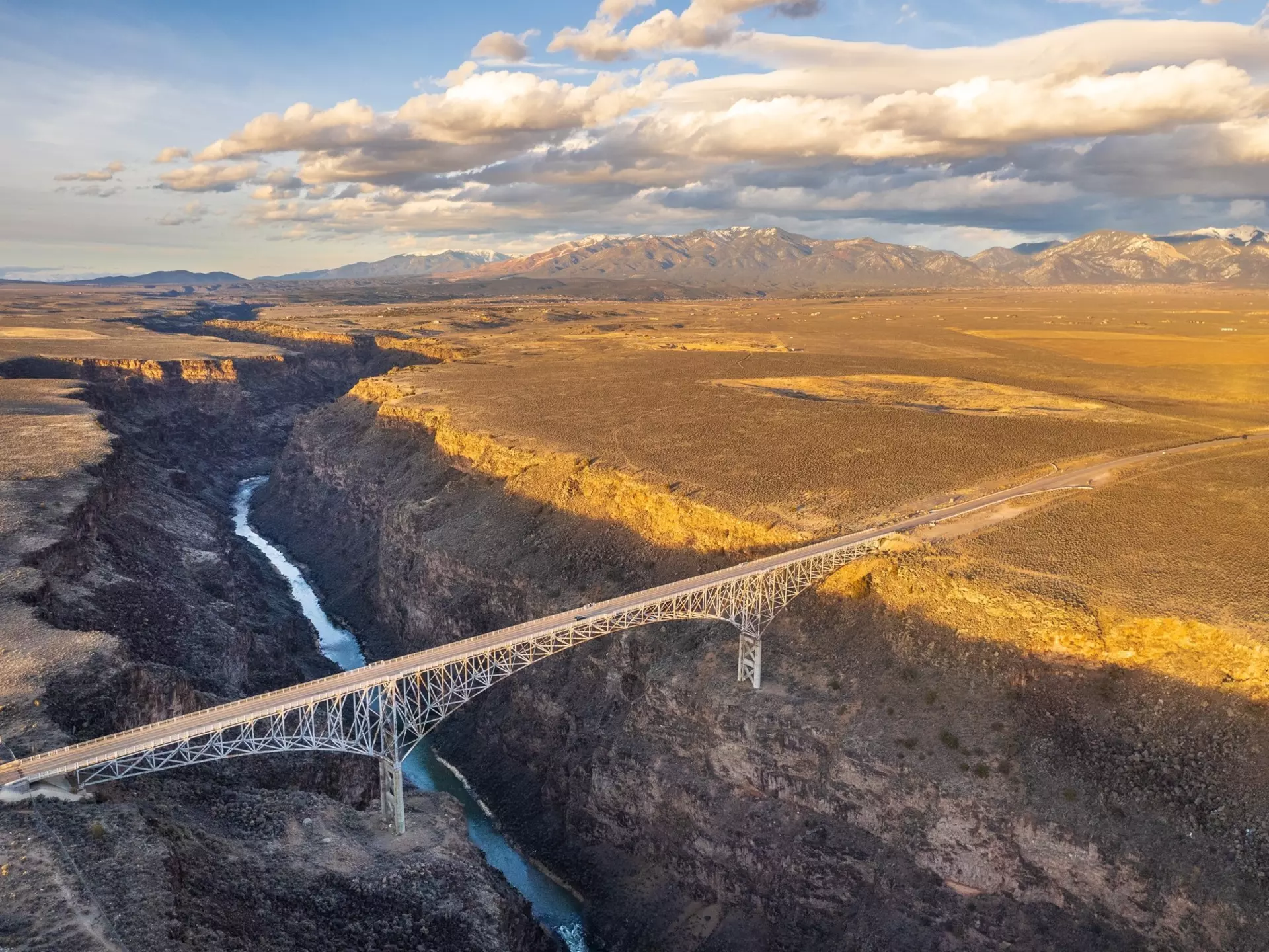 An aerial view of the Rio Grande River Gorge Bridge, which spans this dramatically deep gorge near Taos, New Mexico