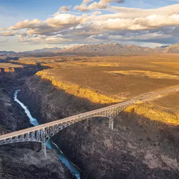 An aerial view of the Rio Grande River Gorge Bridge, which spans this dramatically deep gorge near Taos, New Mexico