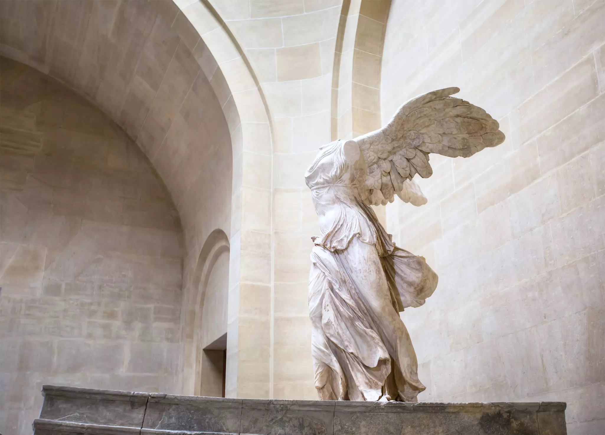 The Winged Victory of Samothrace, called Nike of Samothrace, marble sculpture in Louvre Museum