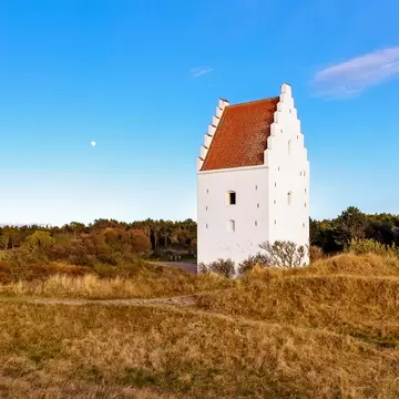 The sand-covered church, locally known as Den Tilsandede Kirke near Skagen, Denmark. 