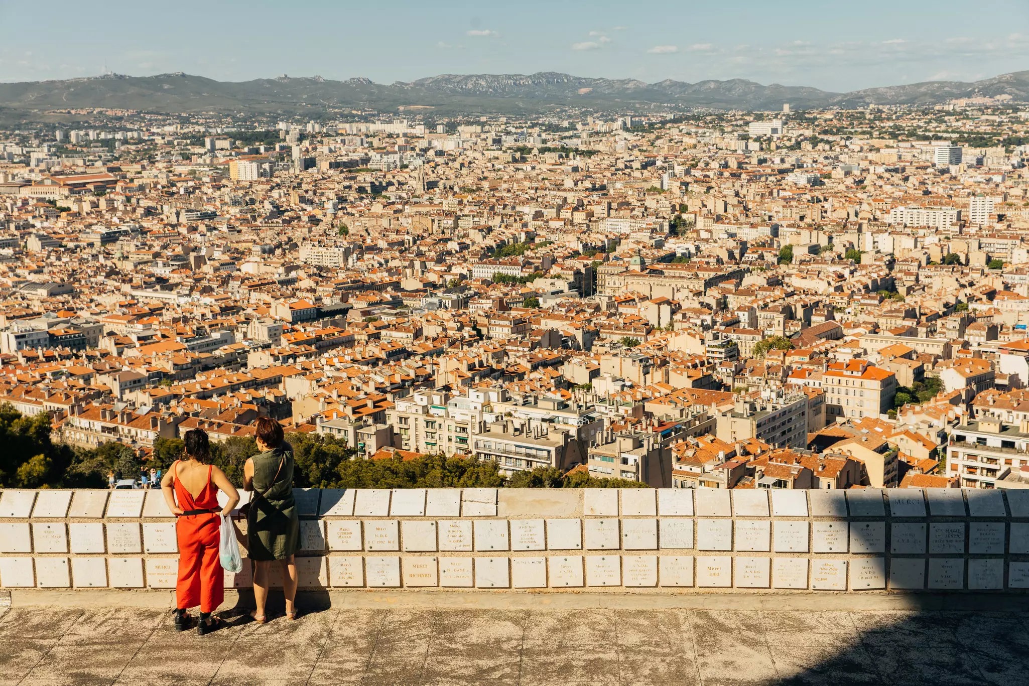 Two women looking over the city of Marseille