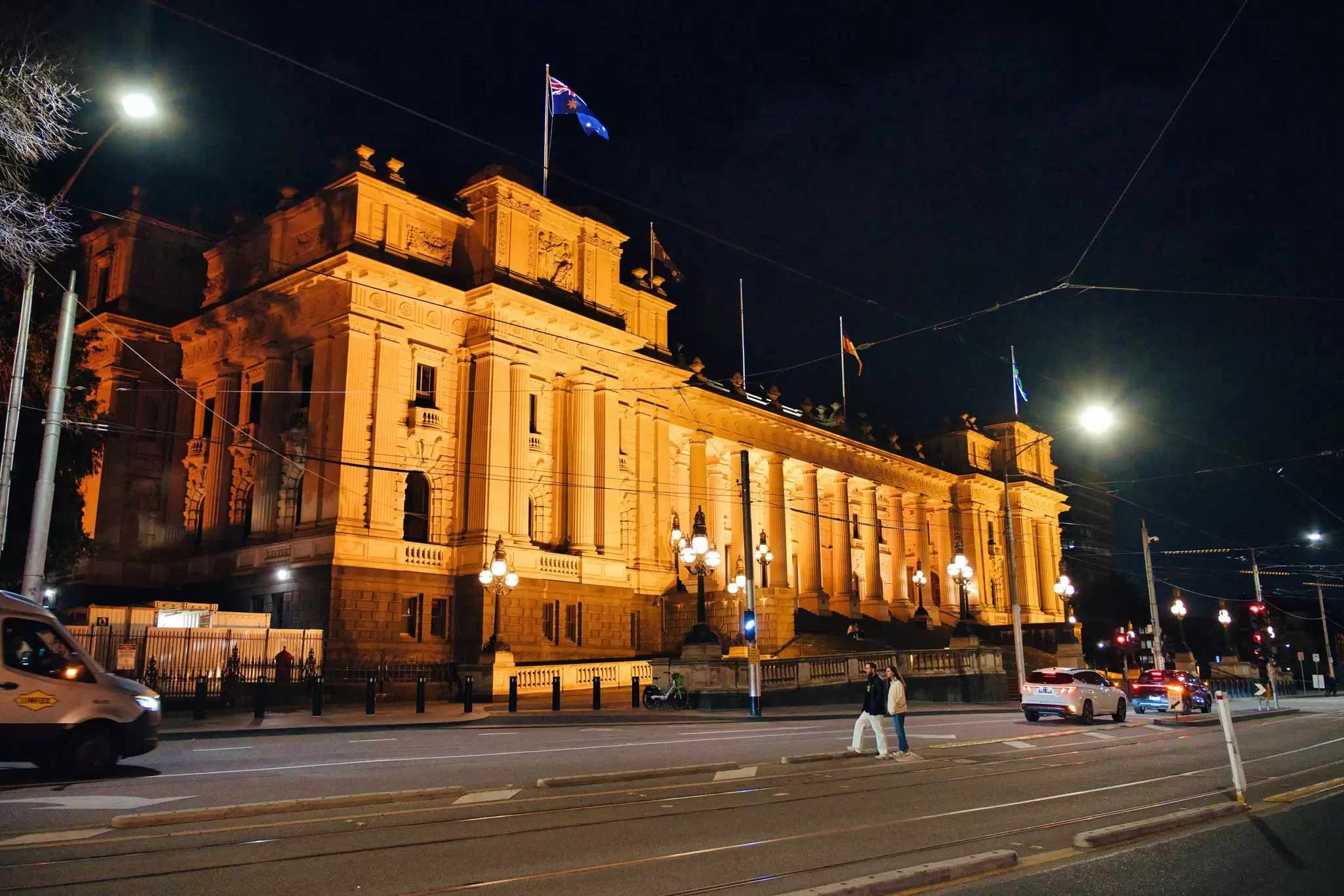 Wide angle picture of Parliament House at night in Melbourne, Australia.