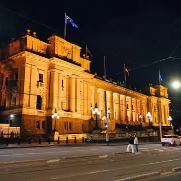 Wide angle picture of Parliament House at night in Melbourne, Australia.
