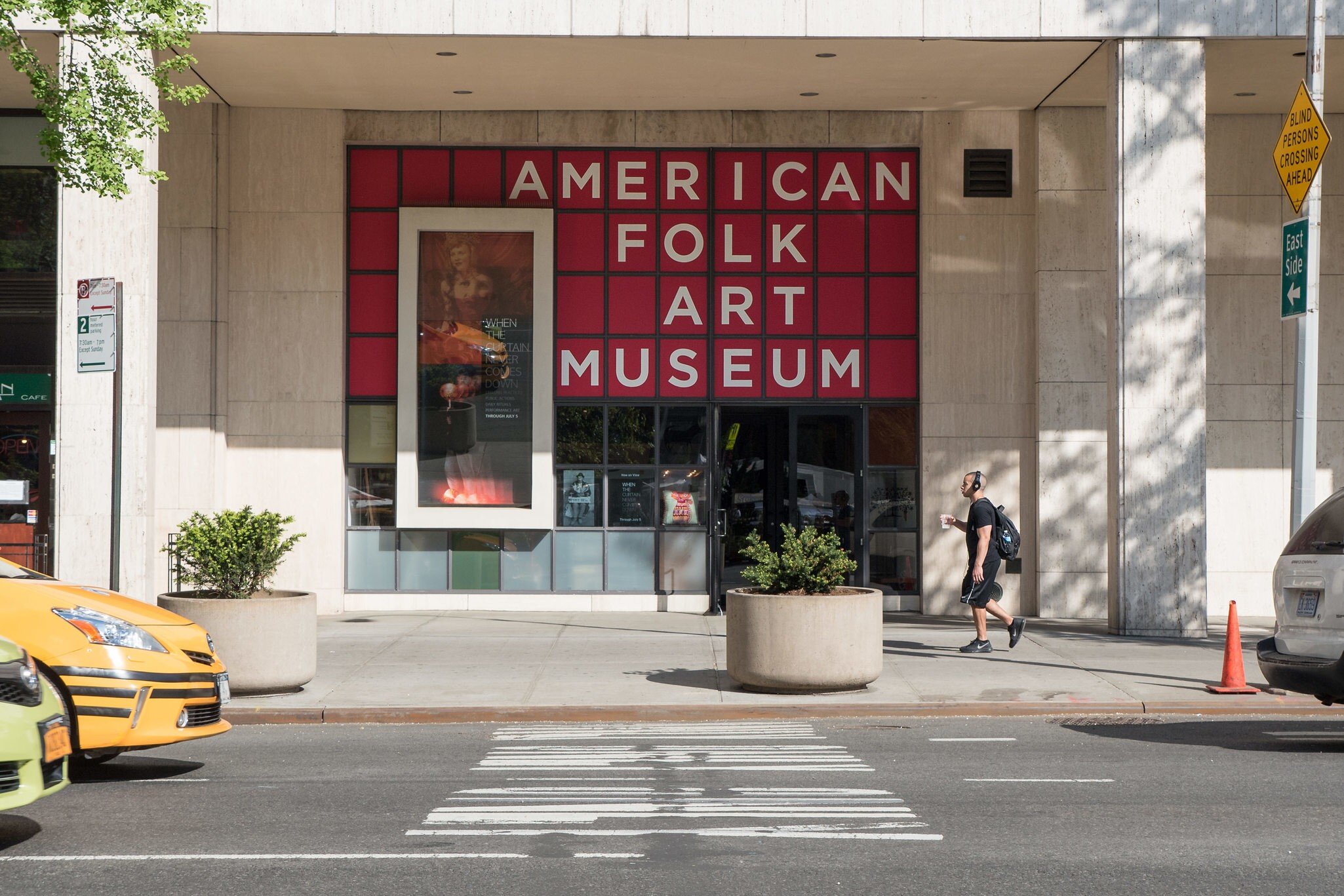NEW YORK CITY - MAY 2015: Entrance of American Folk Art Museum. It is an art museum devoted to the aesthetic appreciation of folk art and creative expressions of contemporary self-taught artists.