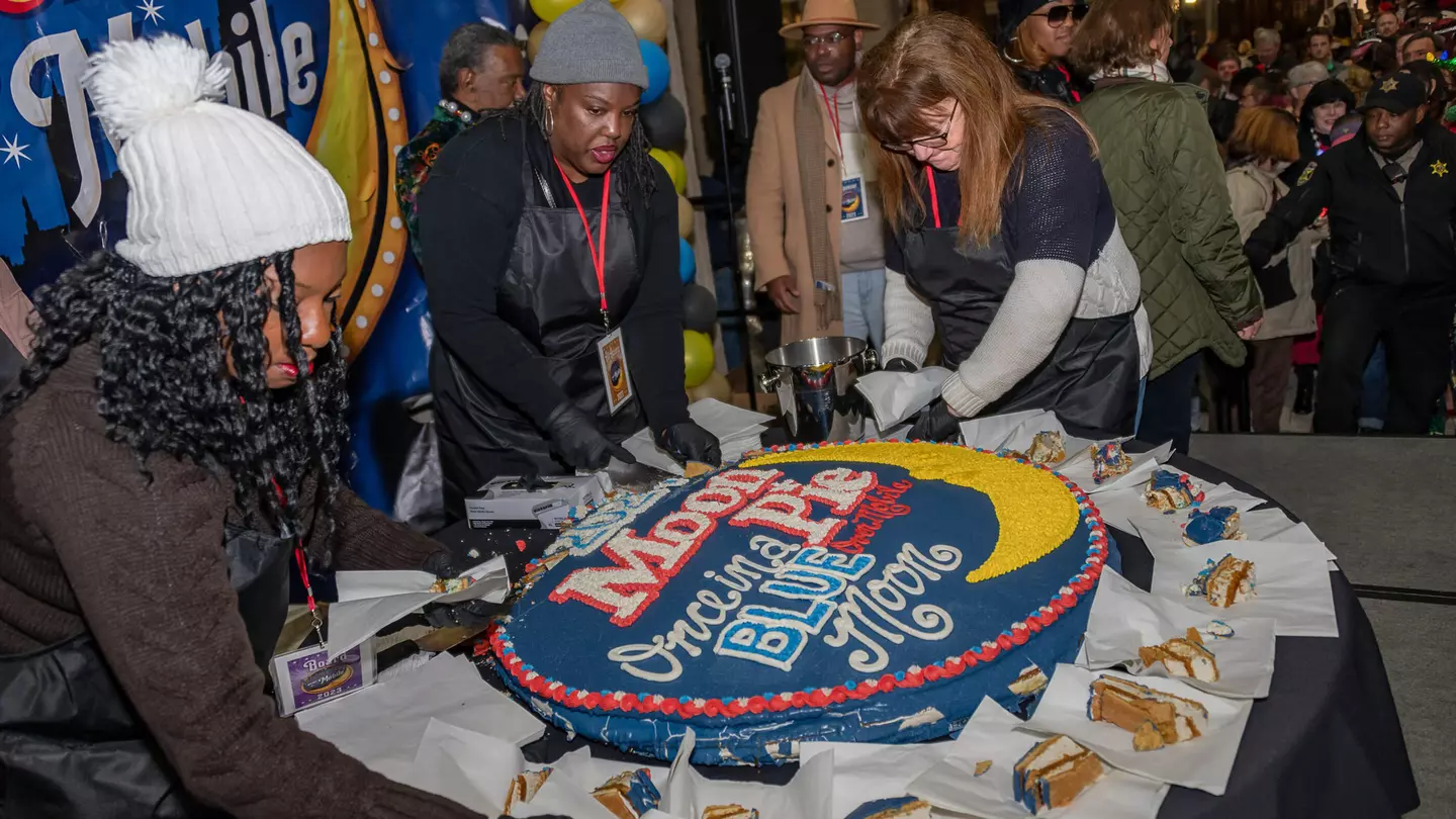 An enormous MoonPie is sliced up at MoonPie Over Mobile in Alabama.