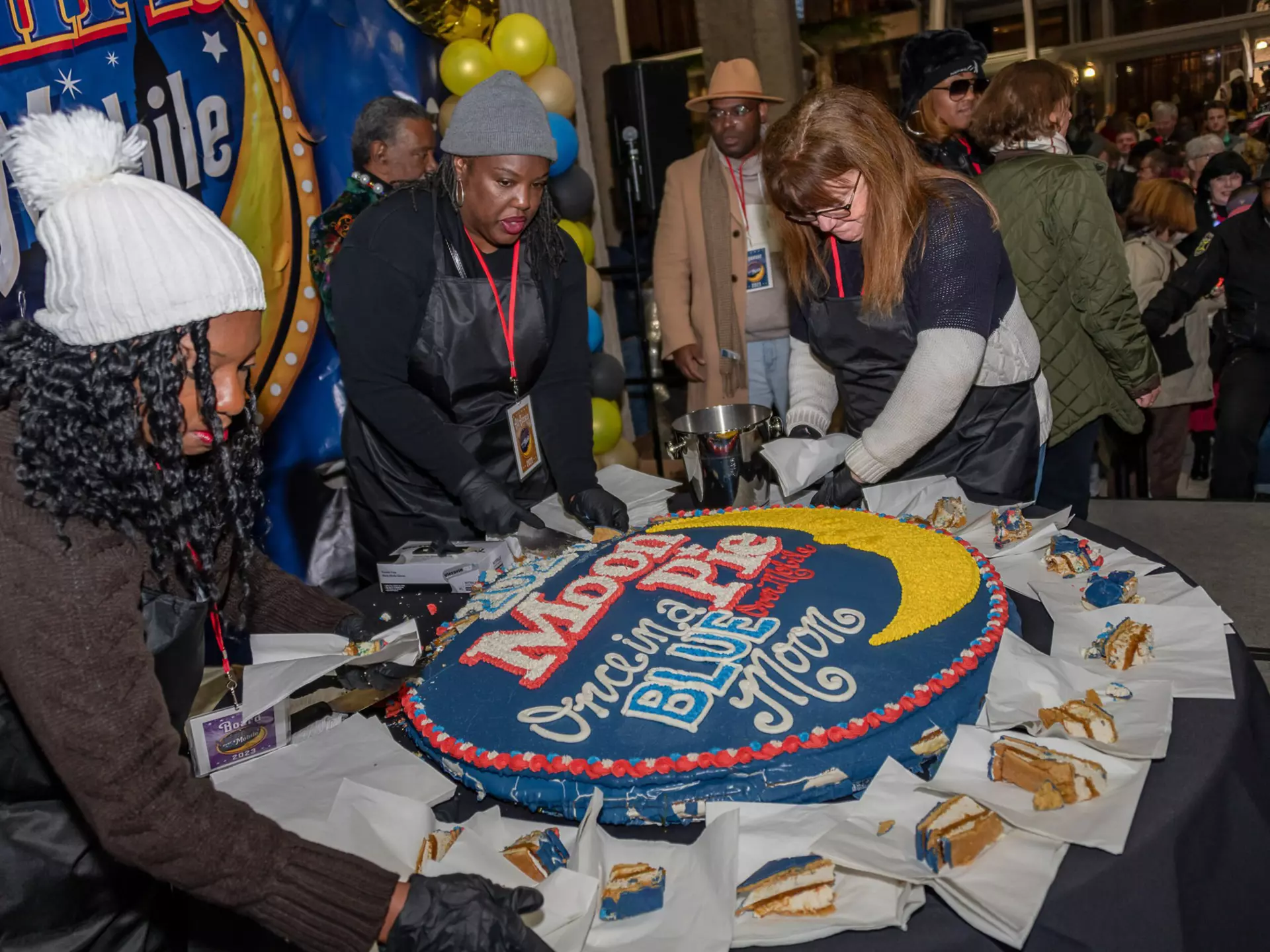 An enormous MoonPie is sliced up at MoonPie Over Mobile in Alabama.