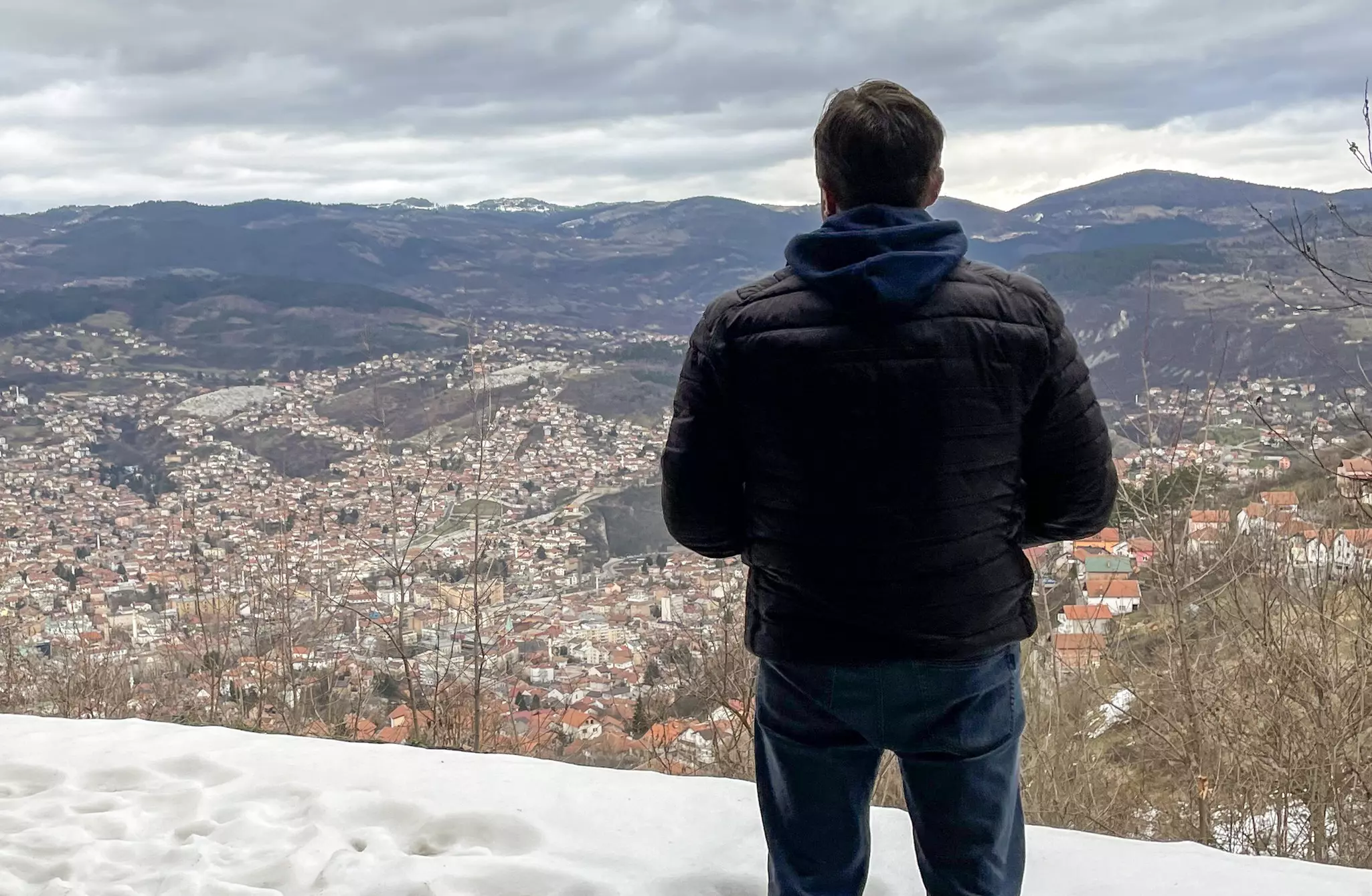 Almir looks out over the city © Robyn Wilson / Lonely Planet