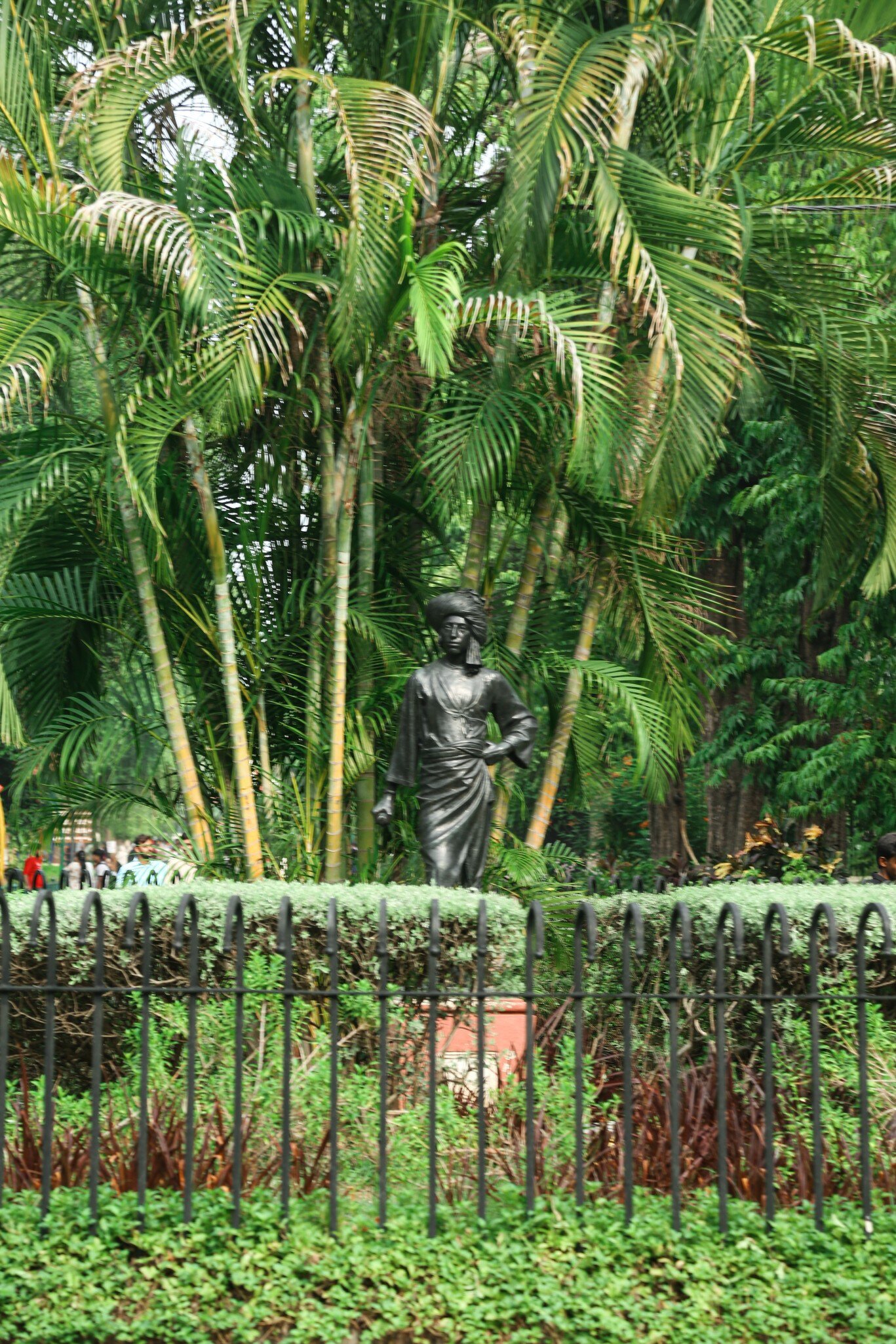Scenic view of the famous Sayaji Baug, popularly known as Kamati Baug public park, featuring lush green trees and landscape design in Vadodara city. Gujarat, India.