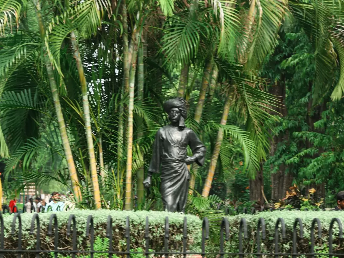 Scenic view of the famous Sayaji Baug, popularly known as Kamati Baug public park, featuring lush green trees and landscape design in Vadodara city. Gujarat, India.