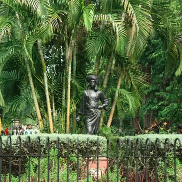 Scenic view of the famous Sayaji Baug, popularly known as Kamati Baug public park, featuring lush green trees and landscape design in Vadodara city. Gujarat, India.