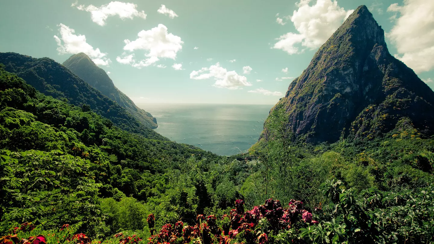 St Lucia’s iconic Pitons and Caribbean Sea (as well as nearby islands) are visible from the Tet Paul Nature Trail © Getty Images