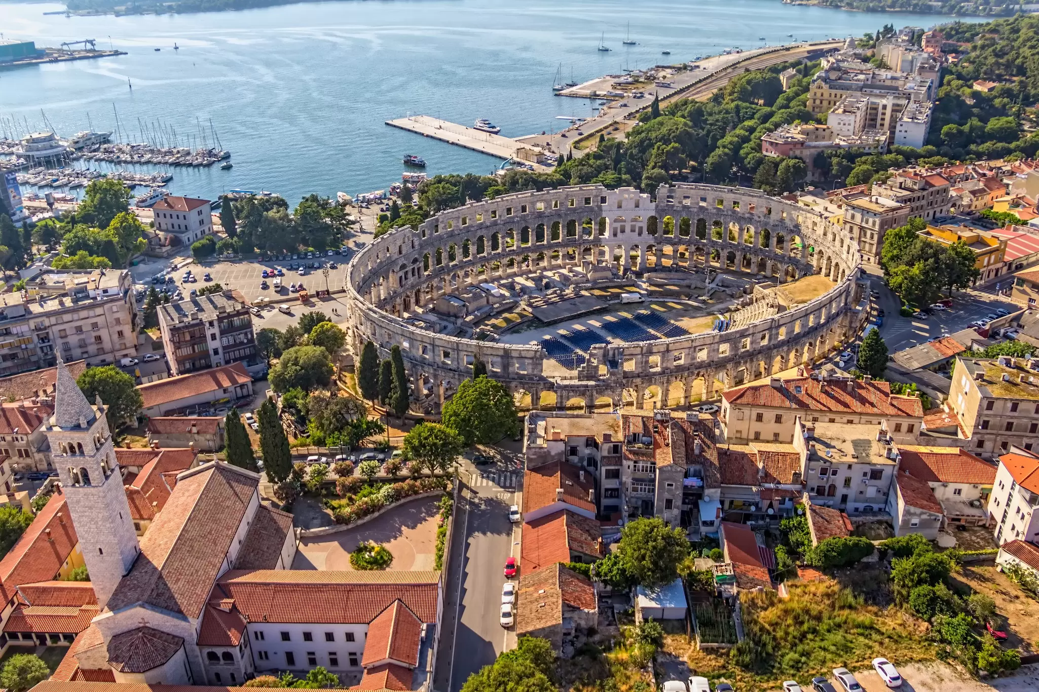Pula's Roman Amphitheatre is a stunning venue for concerts and festivals. Siarhei Kelnik / Getty Images