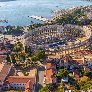 Pula's Roman Amphitheatre is a stunning venue for concerts and festivals. Siarhei Kelnik / Getty Images