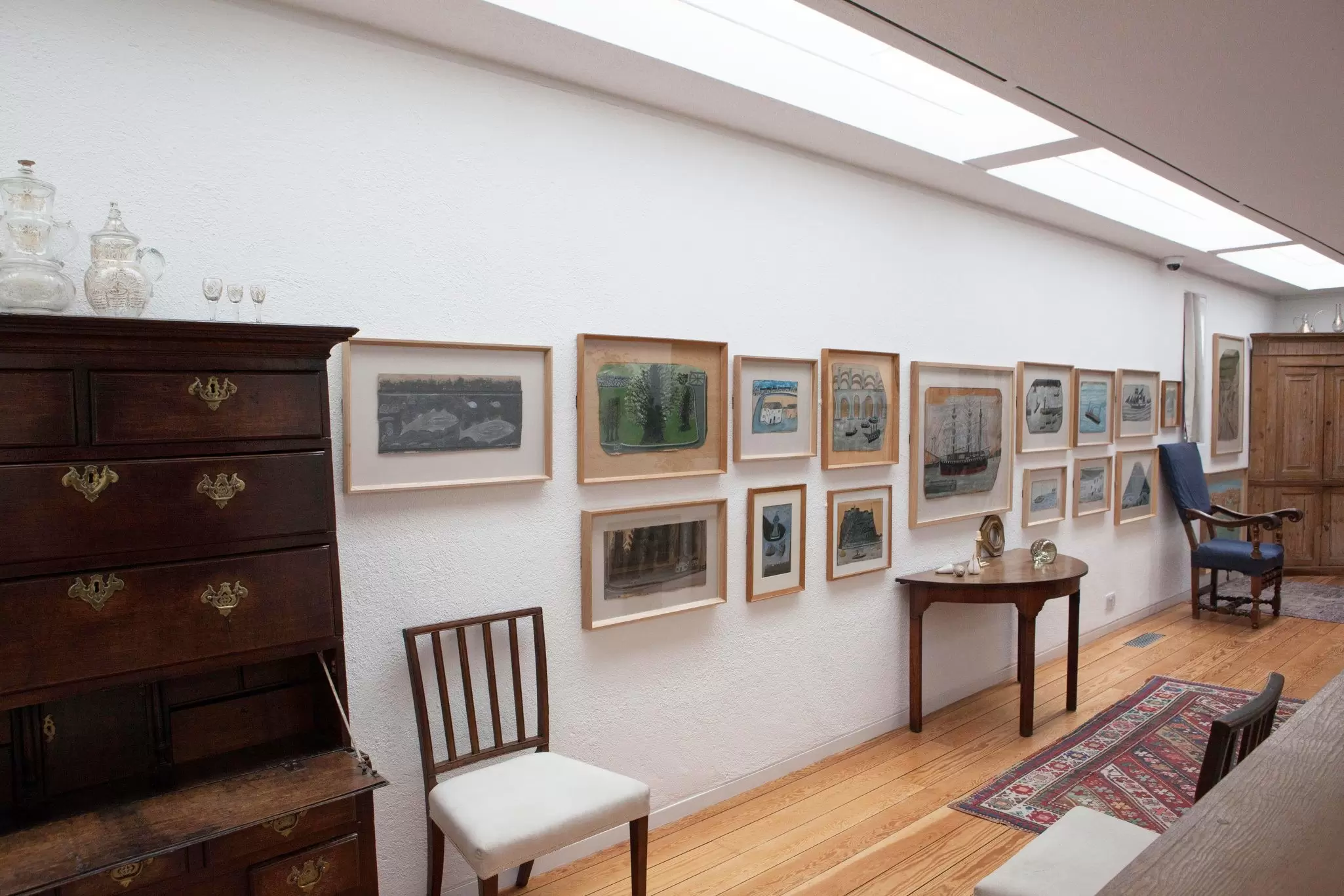 A wall of paintings at Kettle's Yard, Cambridge, UK.