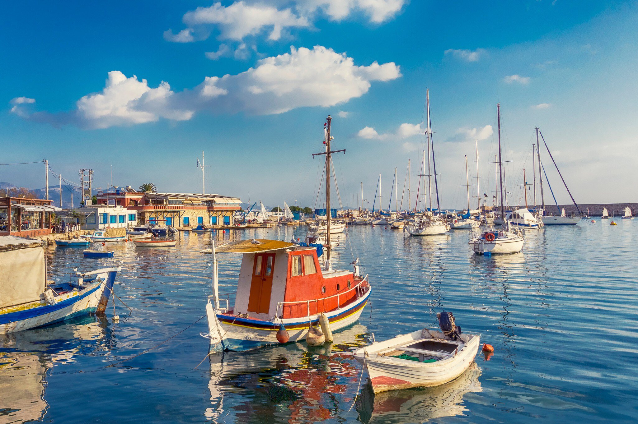 Sailboats moored at the Piraeus harbour.