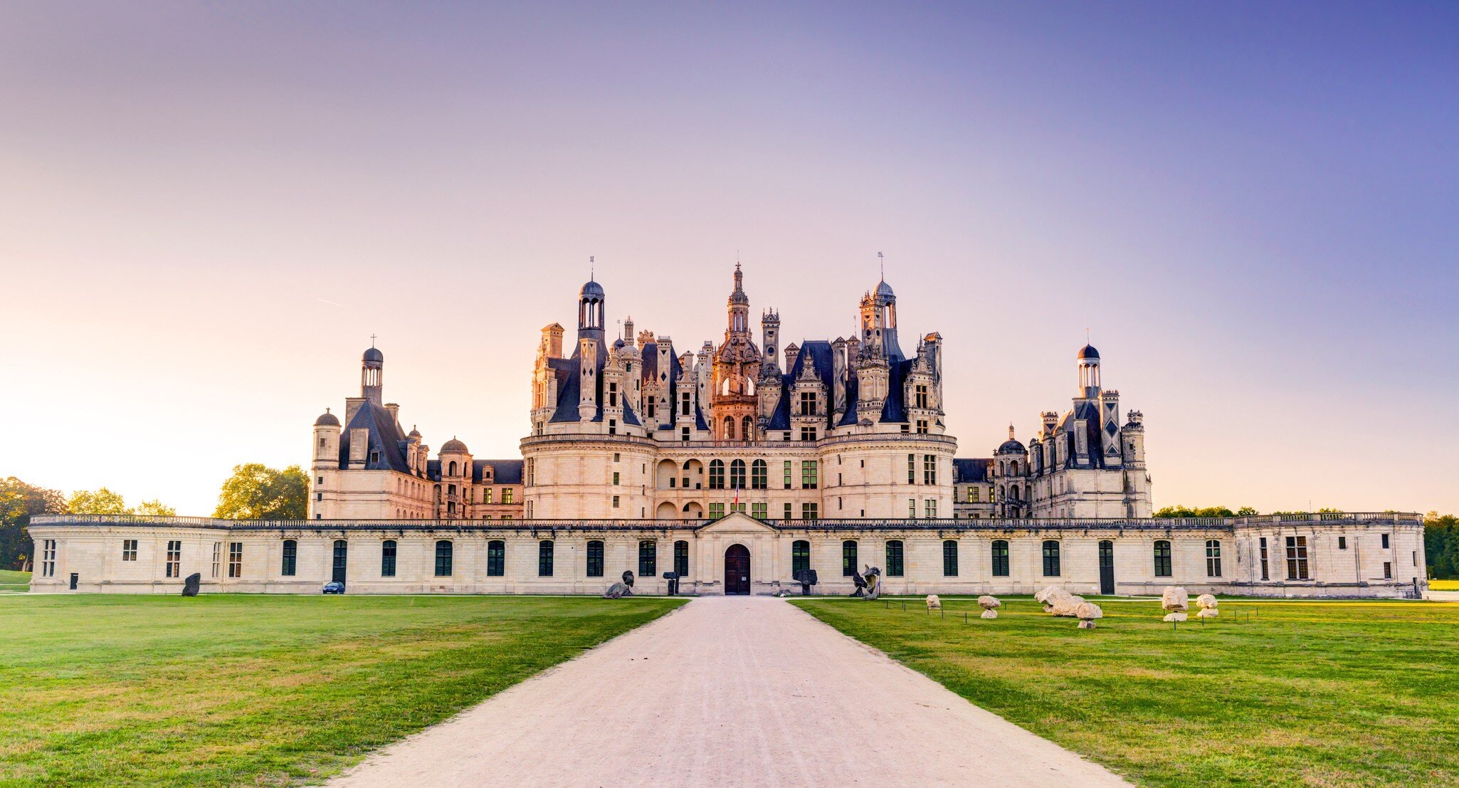 The royal Chateau de Chambord in the evening, France. This castle is located in the Loire Valley, was built in the 16th century and is one of the most recognizable chateaux in the world.