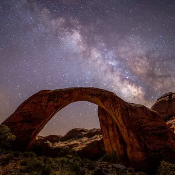 See the Milky Way over Rainbow Bridge National Monument © Ralph Ehoff / Getty Images