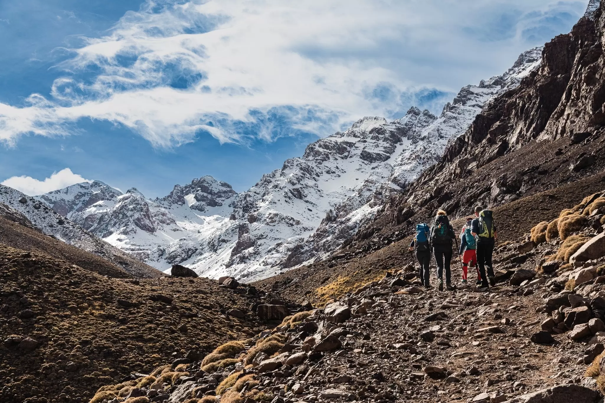 Hiking in the High Atlas mountains. Rockover Production/Shutterstock