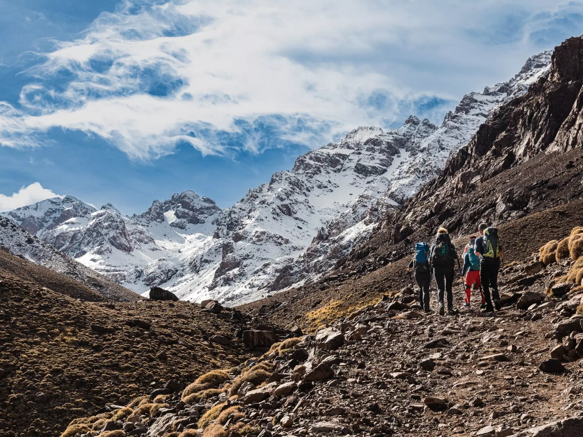 Hiking in the High Atlas mountains. Rockover Production/Shutterstock