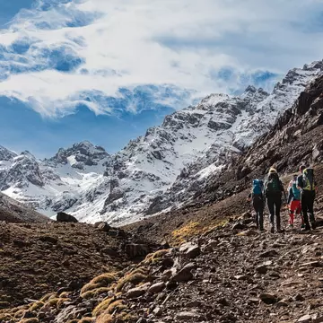 Hiking in the High Atlas mountains. Rockover Production/Shutterstock