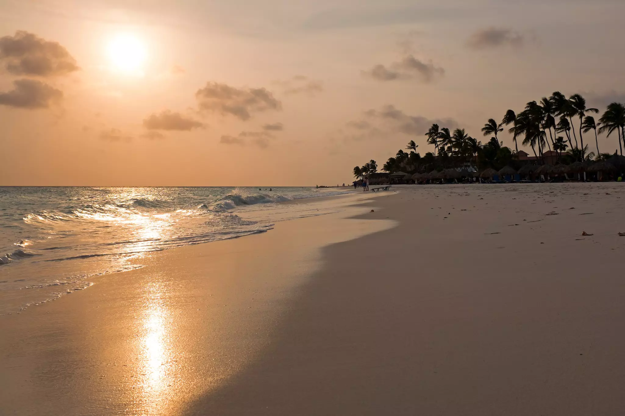 Manchebo beach on Aruba island at sunset in the Caribbean