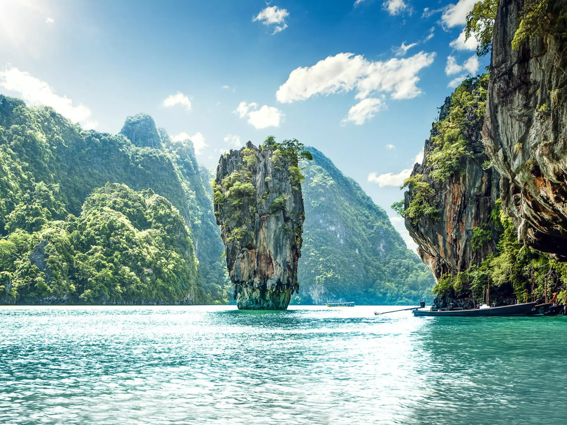 Panorama of limestone karst mountains at James Bond Island in Phang Nga Bay.
313313921
island, popular, thailand, tropics, tropical, cloud, travel, rock, excursion, landmark, attraction, summer, andaman, asia, paradise, thai, nail, place, iconic, famous, vacations, bay, tourism, sea, beautiful, water, nature, exotic, asian, landscape, phuket, destination, park, national, james, khao, kan, bond, phang, tourist, nga, phing