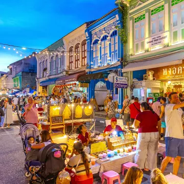 Talang Rd in old Phuket Town on the island of phuket Thailand better known as Sunday walking street night markets with a plethora of street vendors with stalls of food and Thai handcraft, 