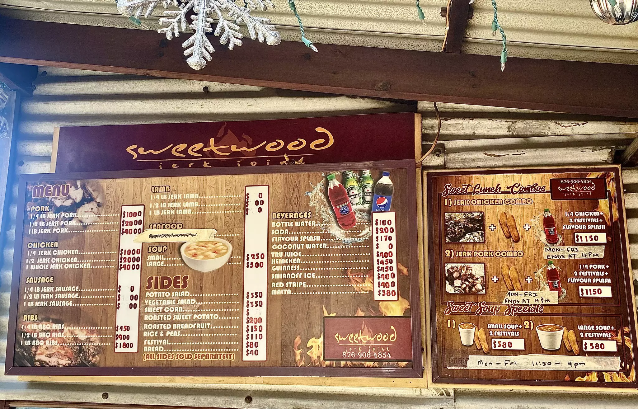 The menu board at Sweetwood Jerk Joint, Kingston, Jamaica