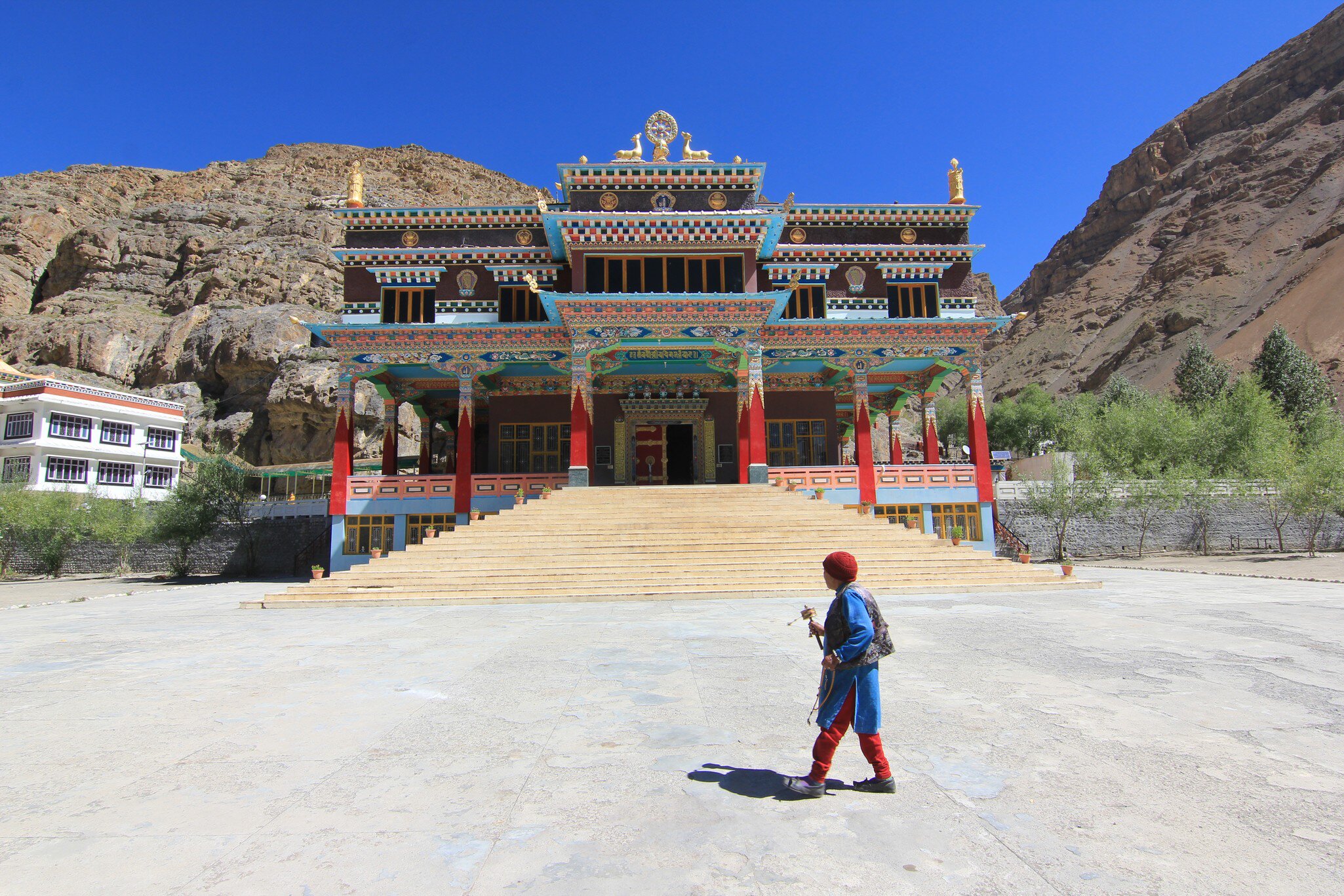 A lone devotee walks past the Sakya Tangyud Monastery in Kaza, Himachal Pradesh, India.
