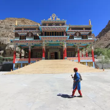 A lone devotee walks past the Sakya Tangyud Monastery in Kaza, Himachal Pradesh, India.