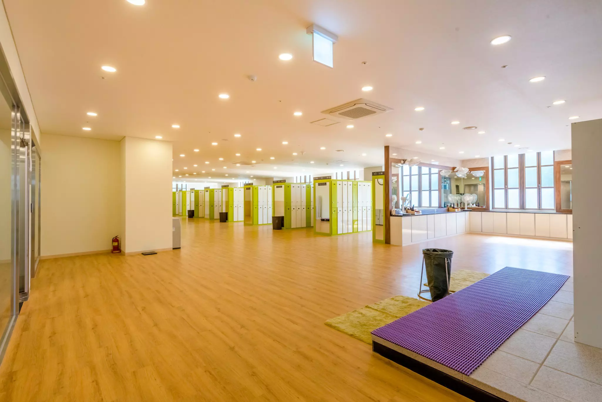 A locker room and changing room inside a Korean bathhouse.