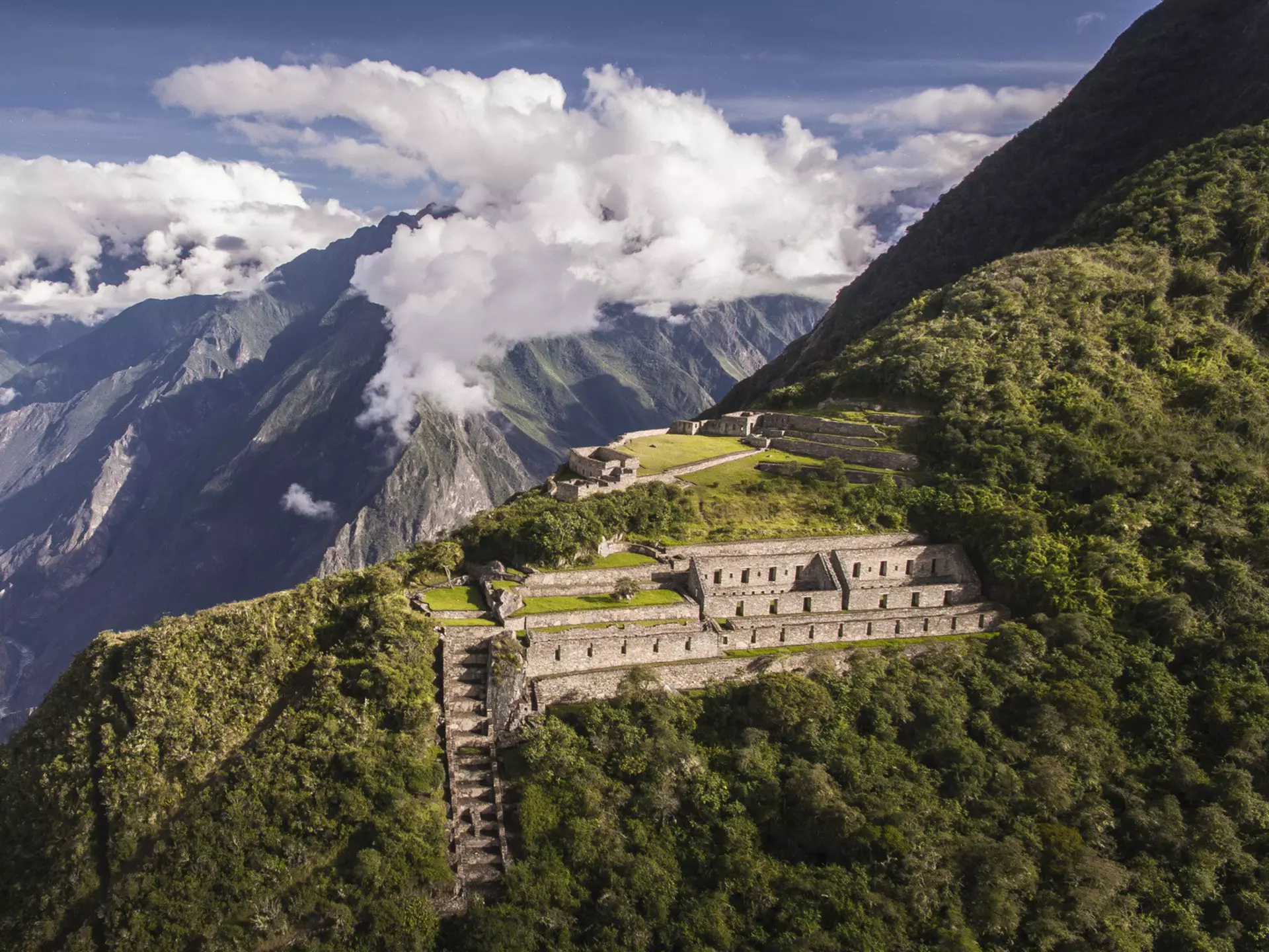 Choquequirao is an Incan site in south Peru, similar in structure and architecture to Machu Picchu. The ruins are buildings and terraces at levels above and below Sunch'u Pata, the truncated hill top