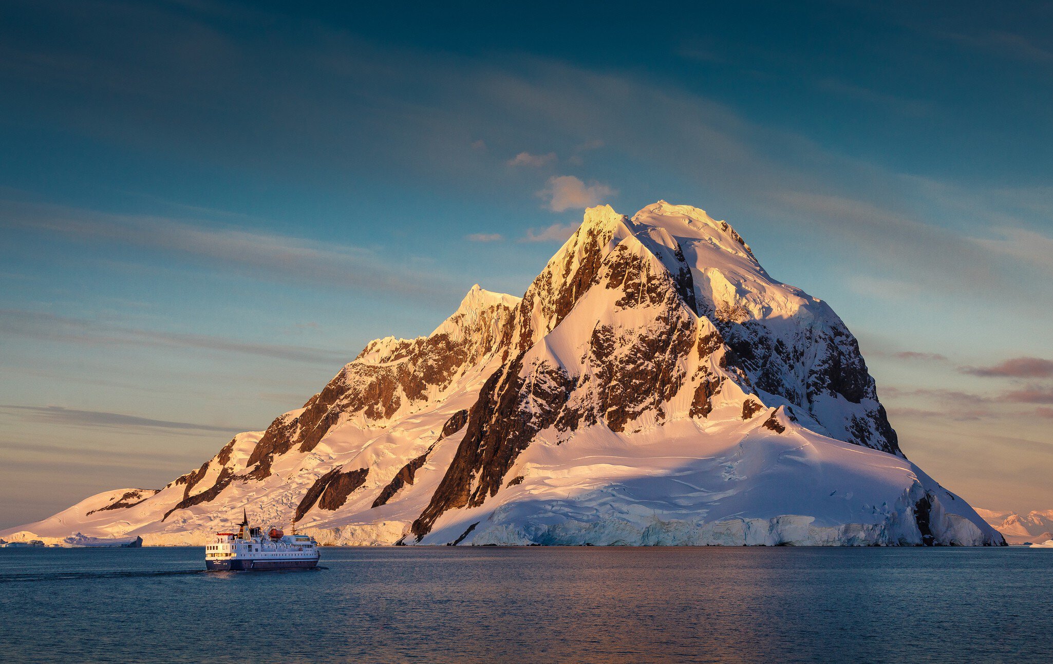 Ship entering the Lemaire Channel, Antarctica.
mountains, winter, boat, cold, travel, blue, clouds, summer, ship, snow, face, canon, mountain, ice, blue sky, peak, photography, slow, cruise, cruising, tall, southern ocean, davidmerronphotography, Antarctica, Sunset, Lemairechannel, Lemaire channel
