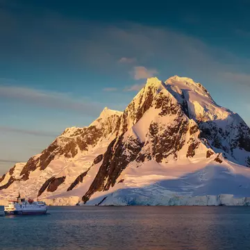 Ship entering the Lemaire Channel, Antarctica.
mountains, winter, boat, cold, travel, blue, clouds, summer, ship, snow, face, canon, mountain, ice, blue sky, peak, photography, slow, cruise, cruising, tall, southern ocean, davidmerronphotography, Antarctica, Sunset, Lemairechannel, Lemaire channel