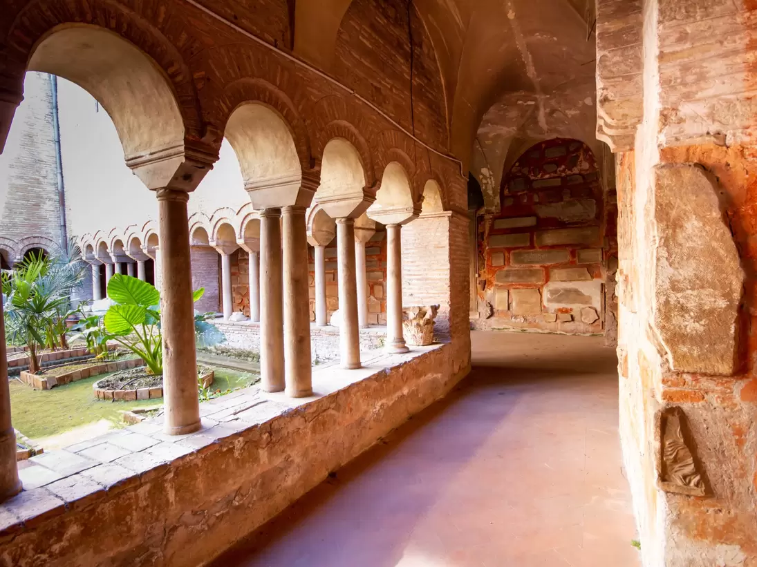 Rome, Italy- April 8,2021: The Cloister of The Basilica of San Lorenzo fuori le Mura.A square corridor built in the 12th century,Numerous sarcophagi and bas-reliefs are arranged along the walls; Shutterstock ID 1954131592; purchase_order: 65050; j...