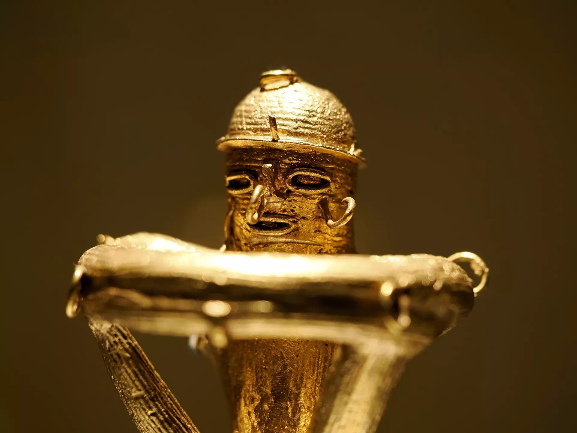 A figurine made of gold on display at the Museo de Oro, Bogotá, Colombia. Andrea Izzotti/Shutterstock
