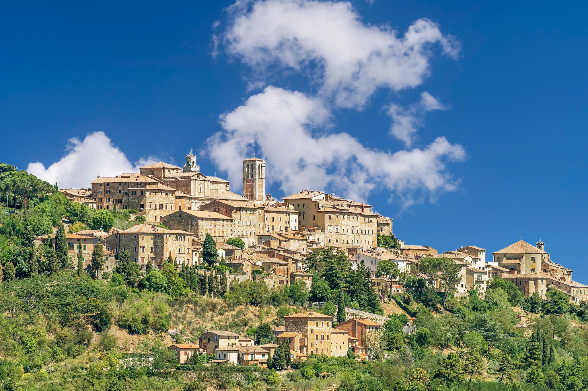 Stunning view of the Tuscan hilltop village of Montepulciano, Siena, Italy, on a sunny day with some white clouds
1711392946
aerial, ancient, architecture, belfry, blue, building, church, city, cityscape, clouds, cloudscape, countryside, europe, fields, green, hill, hilltop, hilly, historic, houses, italian, italy, landscape, medieval, montepulciano, mountain, nature, old, orcia, panorama, panoramic, rural, scenery, scenic, siena, sky, skyline, summer, sunny, tourism, town, travel, tuscan, tuscany, urban, val, val di chiana, view, village, vineyards