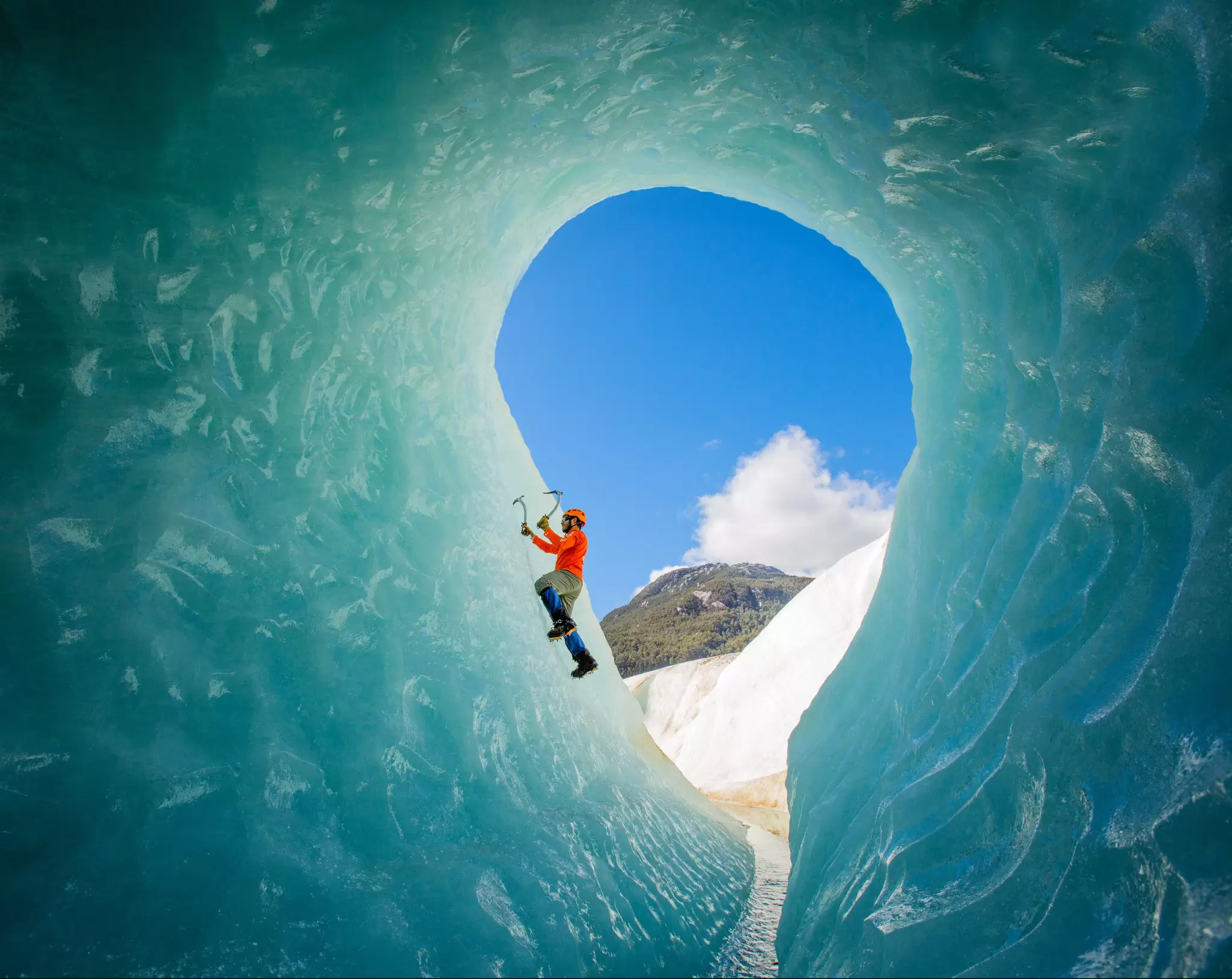 An ice climber scaling a glacier in Patagonia