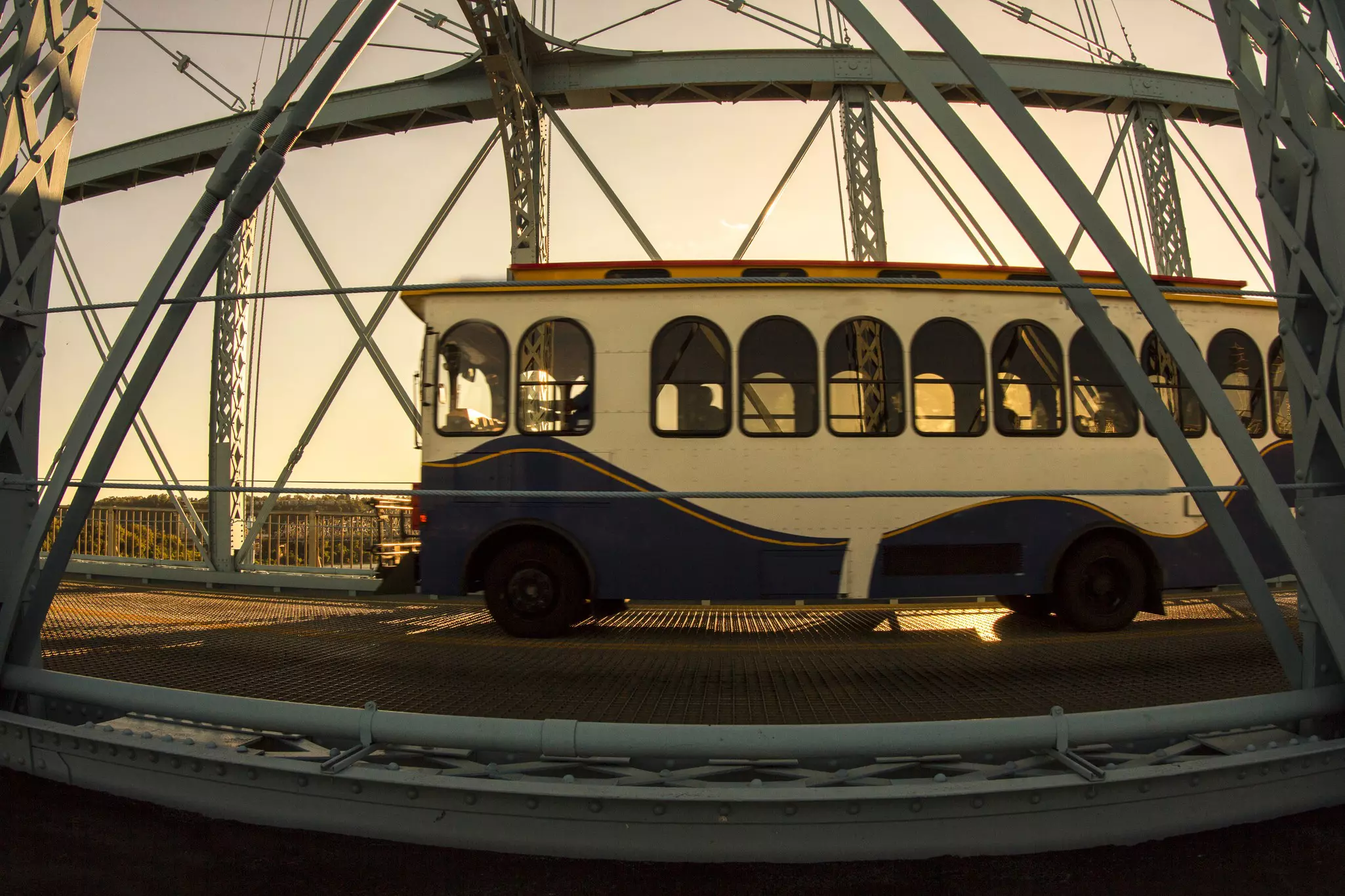 old trolley driving over a bridge in Cincinnati Ohio