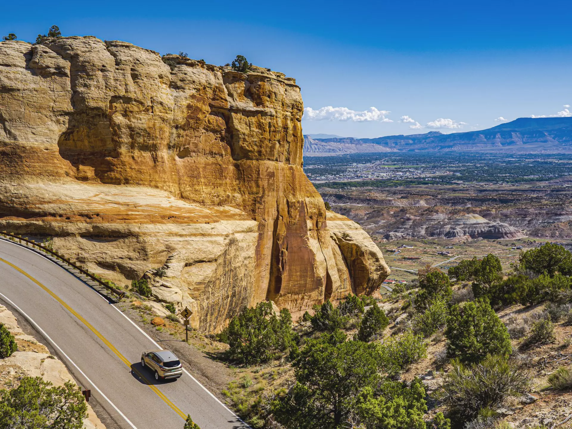 With hairpin turns, high altitude summits and stunning vistas, Colorado’s road trips are as fun as they are beautiful. Thomas Roche/Getty Images